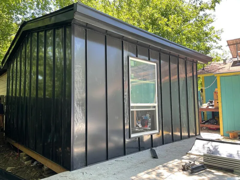 Black standing seam metal wall panels for Roof Inspection in Reidsville